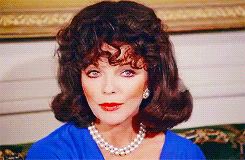 Joan Collins Smoking GIF - Find & Share on GIPHY