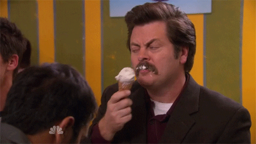 A man licking ice cream.