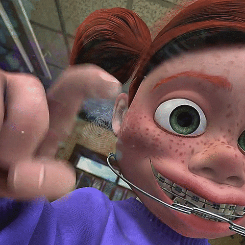 Disney gif. POV of Darla from Finding Nemo tapping on the glass to get the fishes attention. Text, "Vote early."