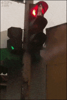 sits traffic light GIF