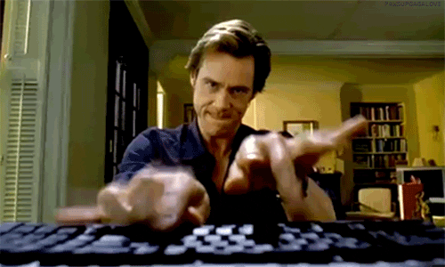 Jim Carrey typing really fast GIF