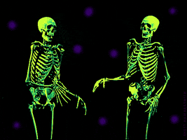 Digital art gif. Two neon green skeletons dance a jerky, bony dance, purple polka dot lights flashing in the background.