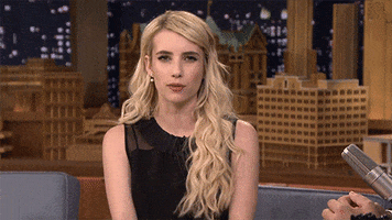Tonight show gif. Emma Roberts glares at us and shifts her jaw like she’s super angry.