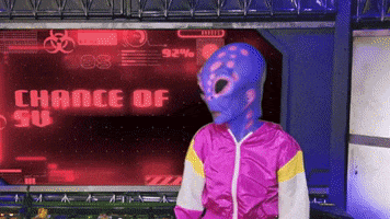 Video gif. A purple speckled extraterrestrial in a pink and white tracksuit crosses its fingers in abject panic. The display behind it reads, "Chance of survival: 5.2%" Text, "Fingers crossed"