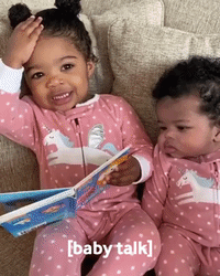 Little Girl Imitates Mom, 'Reads' To Sister