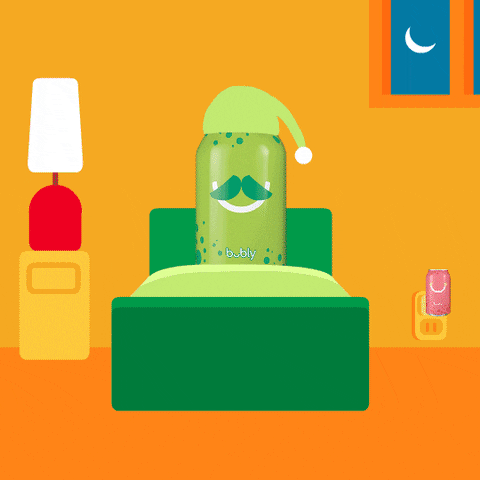 Ad gif. A green Bubly can has a mustache and a nightcap on as it sits in bed. It turns off the lamp next to it and the room goes dark. The only thing lighting the room is a pink Bubly night light plugged in the wall.Text, “Nighty night!”. 