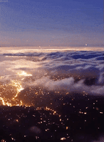 partly cloudy sky GIF