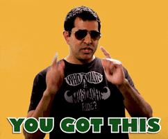 Celebrity gif. Actor Jay Chandrasekhar in aviator sunglasses points finger guns at us while offering an encouraging "You got this."