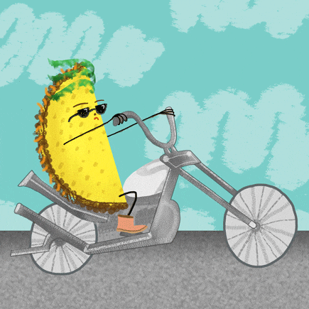 Digital art gif. A cool looking taco with sunglasses on is riding a low-rider bike. The lettuce it has on its head whips in the wind and the wheels of the bike vibrate with the movement.