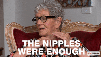 Reality TV gif. Emmie from Gogglebox looks to the side and fiddles with her hands as she says "the nipples were enough," which appears as text.