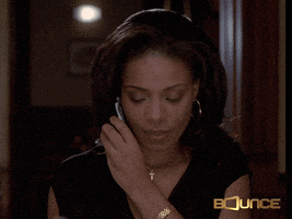 Movie gif. Sanaa Lathan as Syd in Brown Sugar saying "bye" and ending a call on her flip phone.