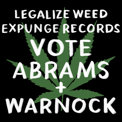 Digital art gif. Green marijuana leaf on a black background with a message in white marker font, "Legalize weed, expunge records, Vote Abrams and Warnock."