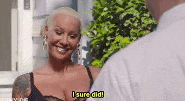 Celebrity gif. Dressed in a black lacy top, Amber Rose shimmies her shoulders and smiles proudly while saying, "I sure did!" which appears as text.
