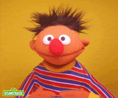Sesame Street gif. Ernie looks at us, smiling widely and giving a big thumbs up.