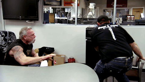 Orange county choppers paul sr and paul jr fight and start throwing chairs and trashcans gif