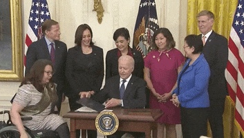 Joe Biden Signing Bill GIF by GIPHY News