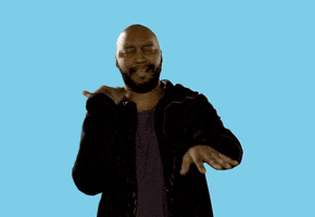 Video gif. Man moves his hand under his chin in a slicing motion and then swipes his hands in front of him basically saying “cut it out” with his hands.