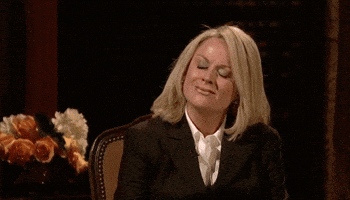 blinking amy poehler GIF by Saturday Night Live