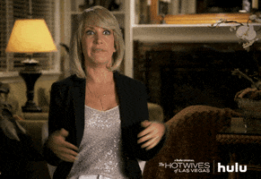 TV gif. Angela Kinsey as Crystal in The Hotwives of Las Vegas flips out her hands and looks upset while her mouth gets blurred out, censored.