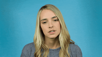 Celebrity gif. Katelyn Tarver eyes closed, gathering strength, puffs out an exasperated sigh, and shakes her head.