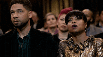 TV gif. Taraji P. Henson as Cookie and Jussie Smollett
 as Jamal in Empire. They're watching someone on stage and getting increasingly embarrassed as Cookie begins to draw a line at her throat, signaling to stop.