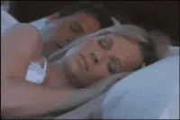  mad frustrated snoring snore couple in bed GIF