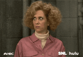 SNL gif. Kristen Wiig looks at something offscreen with a shocked and uneasy expression. She looks away spreading her mouth into a frown, basically saying “yikes” with her face. 