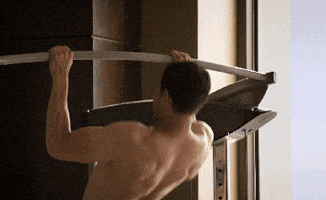 jamie dornan muscles GIF by Fifty Shades