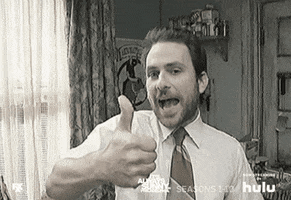 TV gif. In black and white, Charlie Day as Charlie in It’s Always Sunny in Philadelphia gives us two thumbs up.