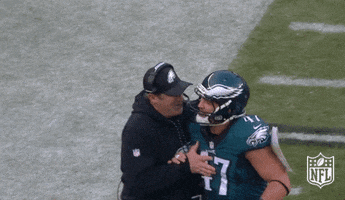 philadelphia eagles man hug GIF by NFL