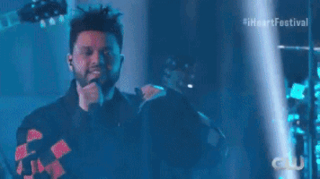 pointing GIF by iHeartRadio