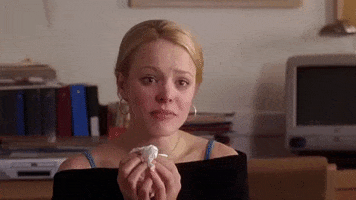 Movie gif. Rachel McAdams as Regina King in Mean Girls, making theatre of bursting into tears to evoke pity, burying her nose into a tissue.