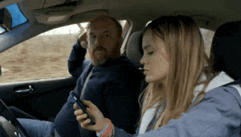 texting and driving louis ck GIF