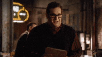 TV gif. Ari Stadham as Sylvester Dodd on Scorpion holds a file and pumps his fist excitedly. He smiles and hops up and down as he says, “Wow…this is going to be so much fun!”