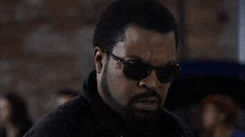 Movie gif. Ice Cube as James in Ride Along 2. He has sunglasses on and his nostrils are flared as he raises his head in shock and annoyance, realizing something unfavorable has happened.