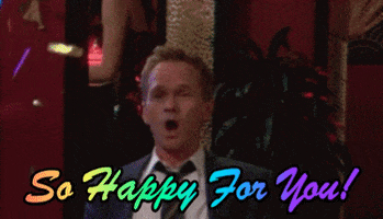 TV gif. Neil Patrick Harris as Barney Stinson from How I Met Your Mother applauds as shiny confetti falls around him. Rainbow text, "So Happy For You!"
