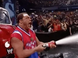 kurt angle firehose GIF by WWE