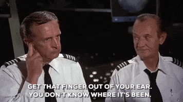 airplane movie get that finger out of your ear GIF