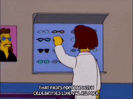 trying them on homer simpson GIF