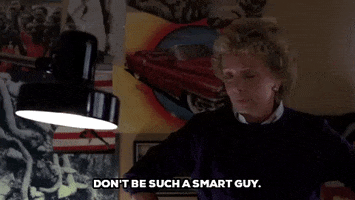 smart ass wise guy GIF