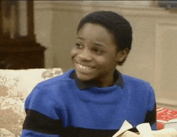 TV gif. Young Malcolm-Jamal Warner, as Theo in The Cosby Show, smiles widely and nods in agreement.