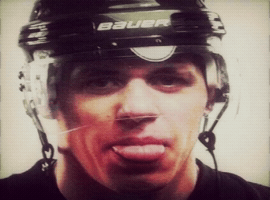 Tounge Out Ice Hockey GIF