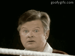 Video gif. A goofy-looking man overacting astonished bewilderment. Text, "WTF???!!!"