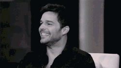  laughing ricky martin GIF