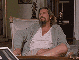 Movie gif. Jeff Bridges as The Dude in The Big Lebowski sprawls out leisurely in a chair, then pulls a pair of sunglasses out of his sweatshirt pocket and puts them on nonchalantly. Text, "Deal with it."