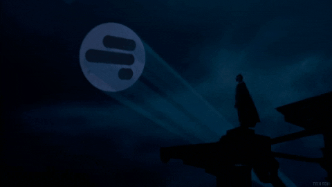 bat signal shining in the sky gif