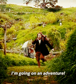 Gif of Bilbo Baggins from The Hobbit running excitedly along a grassy path holding an adventuring contract and saying "I'm going on an adventure!" 