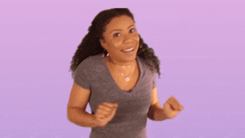 Celebrity gif. Shalita Grant glances upwards as she does a happy dance and twists her arms out in front of her. Text, "Aww yeah!'
