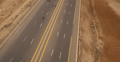 djsnake driving motorcycle road desert GIF