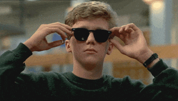 Property Listing Scams Image: gif of brian from the breakfast club putting on sunglasses confidentely